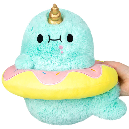 Squishable Mini Sparkles the Narwal in a Donut